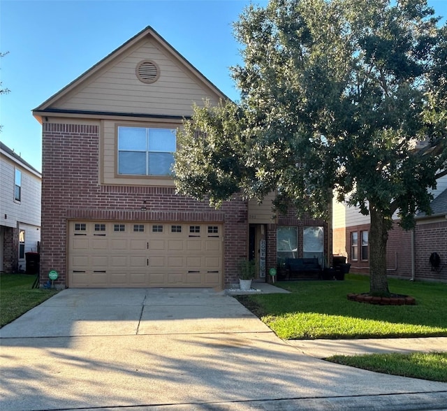 view of front of property featuring a garage and a front yard