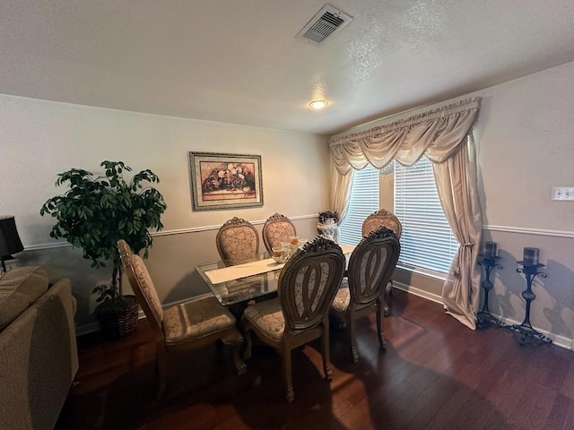 dining room featuring dark hardwood / wood-style floors