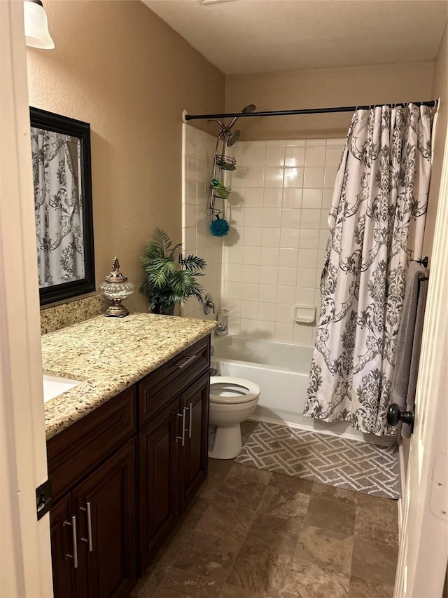 full bathroom with vanity, toilet, and shower / tub combo with curtain