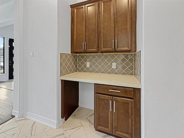 kitchen with tasteful backsplash