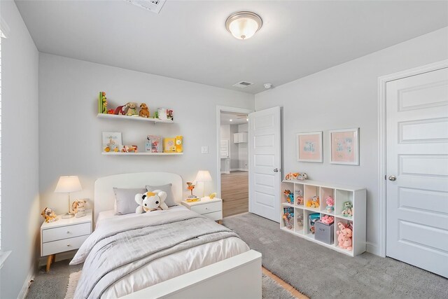 bedroom featuring carpet flooring