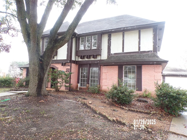 view of tudor-style house