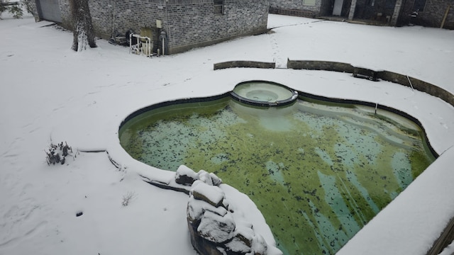 exterior details featuring a jacuzzi