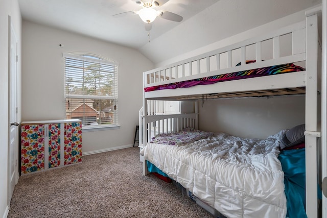 bedroom featuring vaulted ceiling, carpet floors, and ceiling fan