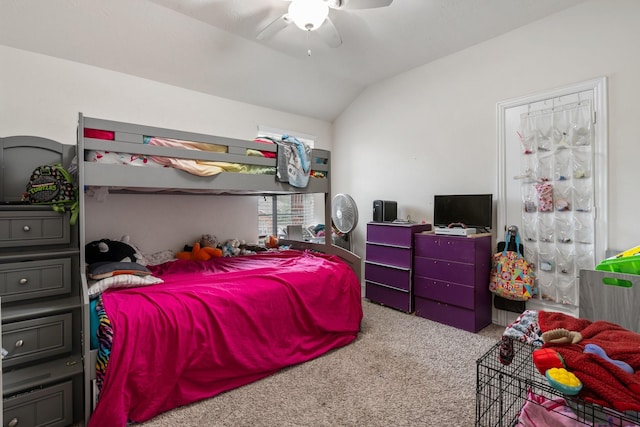 carpeted bedroom featuring ceiling fan and lofted ceiling