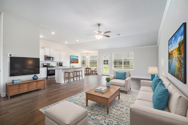 living room featuring lofted ceiling, dark hardwood / wood-style floors, and ceiling fan