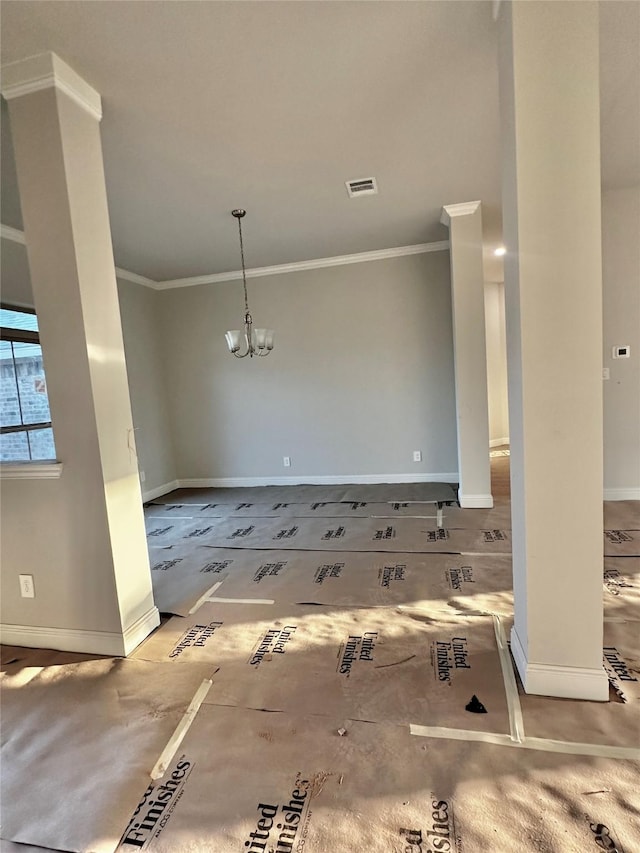 unfurnished dining area featuring baseboards, ornamental molding, visible vents, and an inviting chandelier