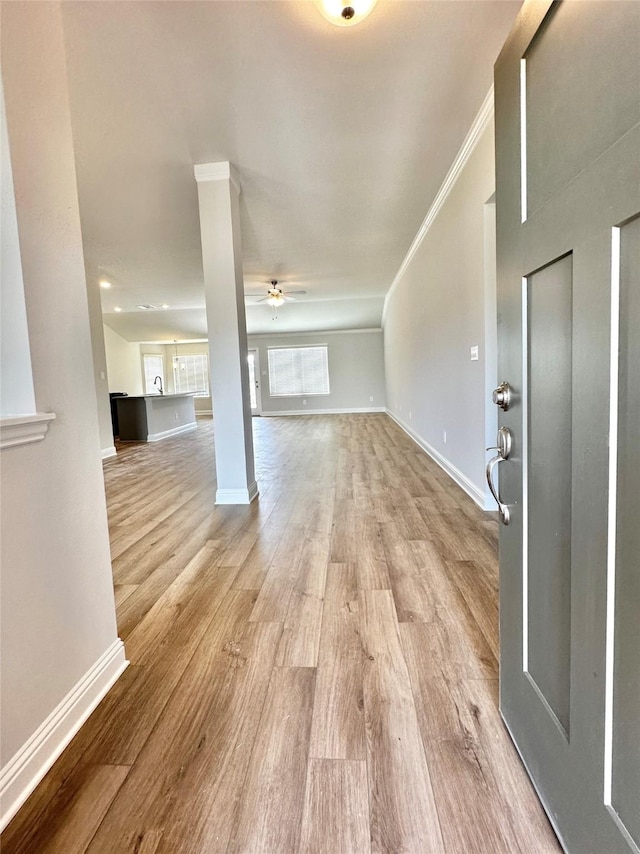 4318 Karam Lndg, Dickinson, TX 77539 - foyer entrance with baseboards, wood finished floors, a ceiling fan, and ornamental molding