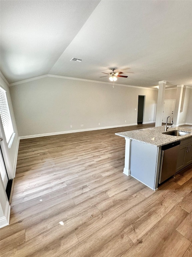 4318 Karam Lndg, Dickinson, TX 77539 - kitchen featuring light wood-style flooring, ornamental molding, ceiling fan, a sink, and stainless steel dishwasher