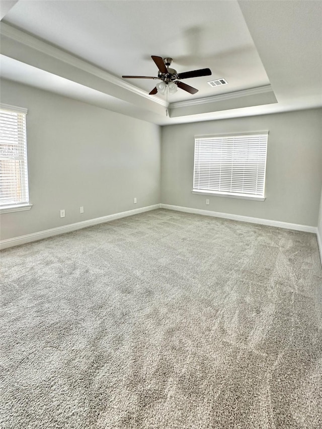 4318 Karam Lndg, Dickinson, TX 77539 - unfurnished room featuring carpet, a tray ceiling, a ceiling fan, and visible vents