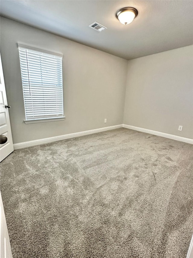 4318 Karam Lndg, Dickinson, TX 77539 - spare room featuring carpet flooring, baseboards, and visible vents