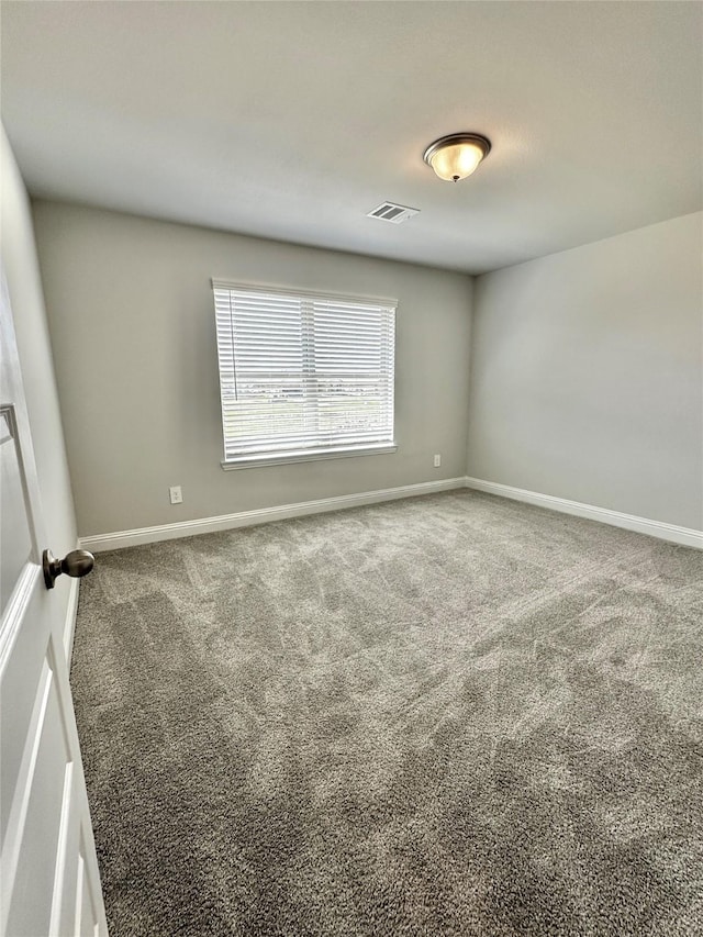 4318 Karam Lndg, Dickinson, TX 77539 - spare room with carpet flooring, baseboards, and visible vents