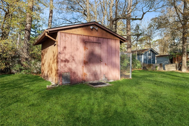 view of outdoor structure featuring a yard