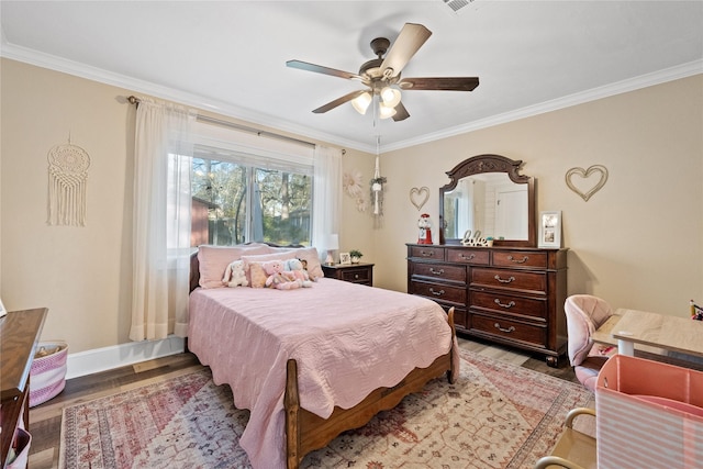 bedroom with crown molding, ceiling fan, and light wood-type flooring