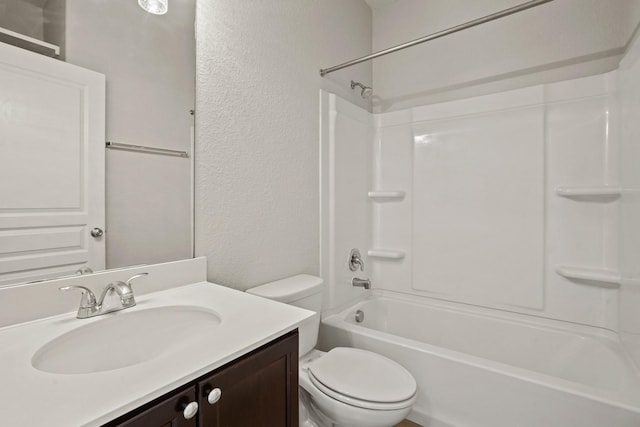 full bathroom featuring vanity, shower / tub combination, and toilet