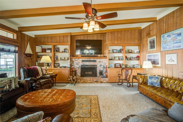 living area with built in features, carpet floors, a fireplace, and wooden walls