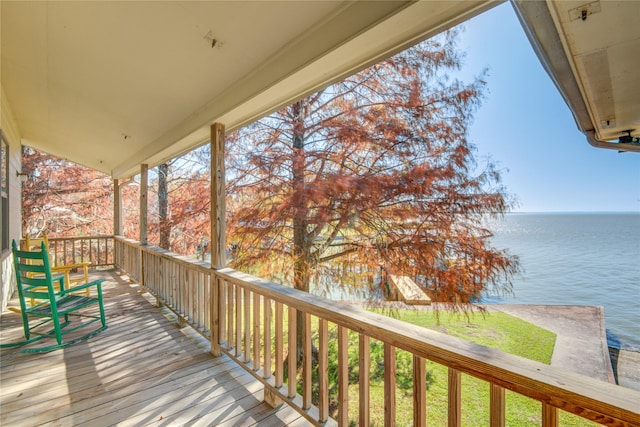 deck featuring a water view