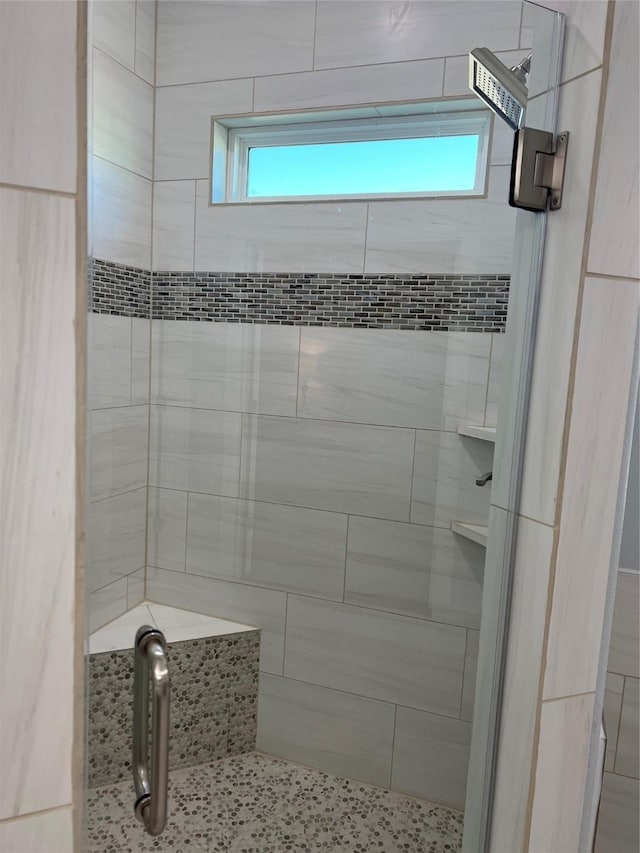 bathroom featuring walk in shower