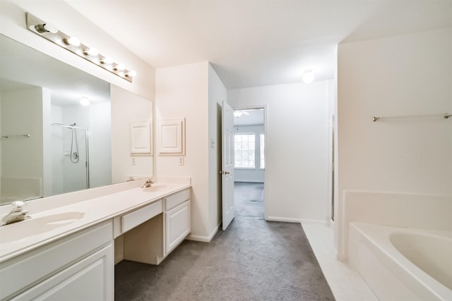 bathroom featuring vanity and separate shower and tub