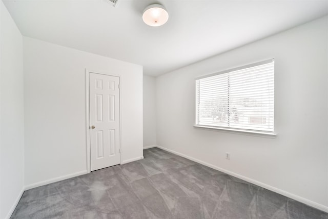 unfurnished bedroom with light carpet