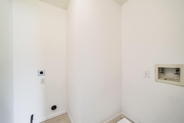 laundry room with laundry area, baseboards, washer hookup, and electric dryer hookup