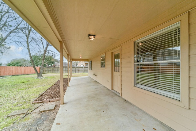 view of patio / terrace featuring fence