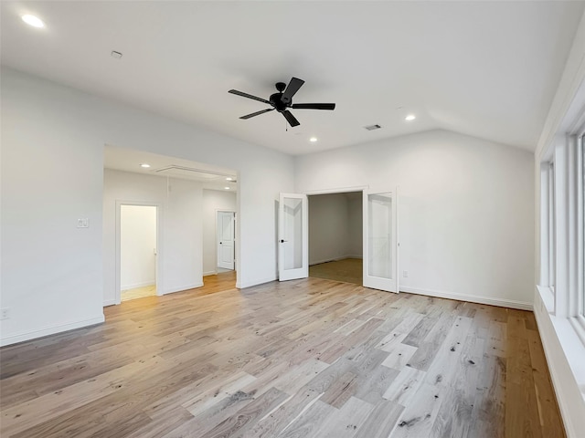 unfurnished bedroom with vaulted ceiling, ceiling fan, and light hardwood / wood-style flooring