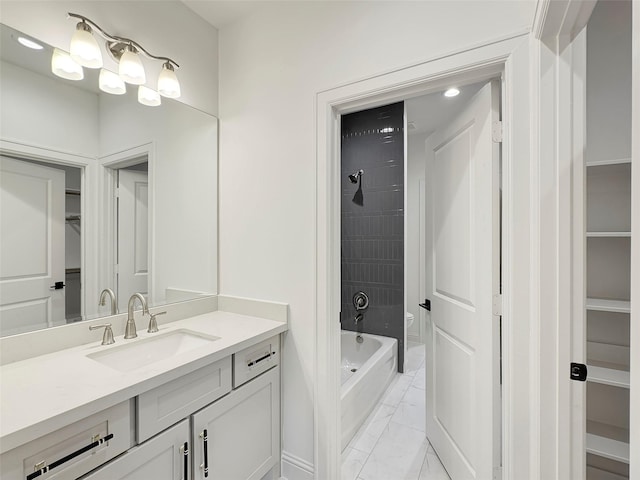 full bathroom featuring vanity, toilet, and separate shower and tub