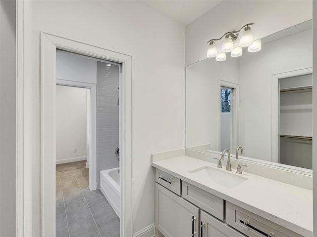 bathroom with vanity and tile patterned flooring