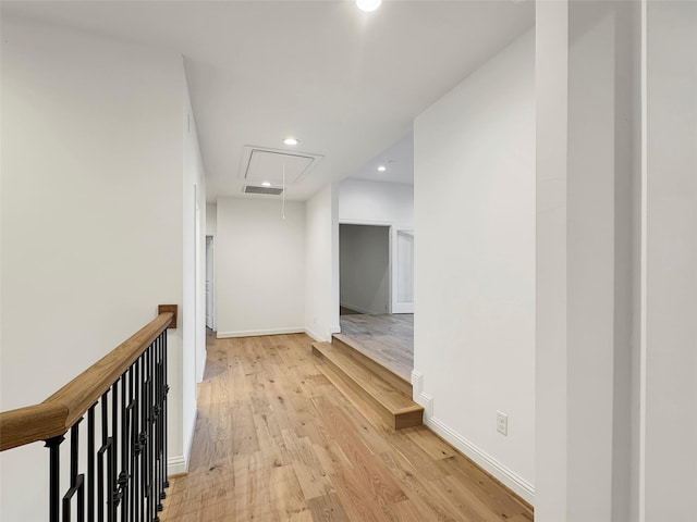 hall with light wood-type flooring