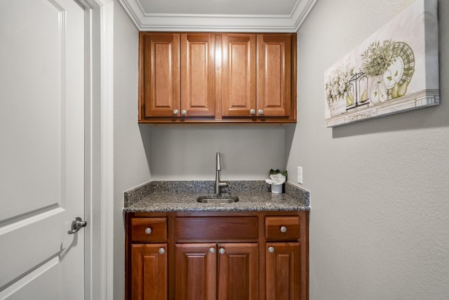 bar with ornamental molding and sink