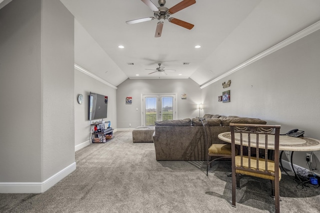 carpeted living room featuring crown molding, ceiling fan, and vaulted ceiling