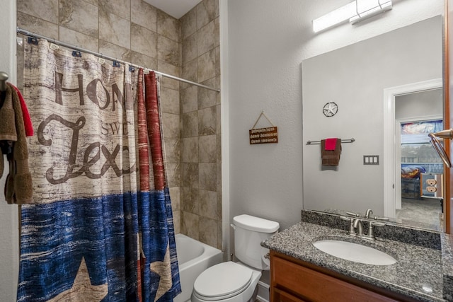 full bathroom with vanity, shower / bath combination with curtain, and toilet