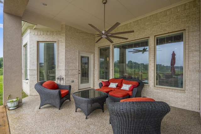 view of patio with ceiling fan and an outdoor living space