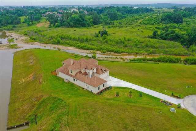 birds eye view of property with a rural view