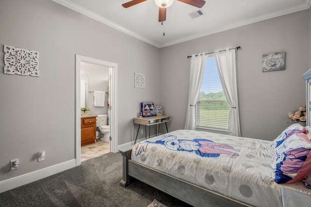 bedroom with light colored carpet, ensuite bath, ornamental molding, and ceiling fan