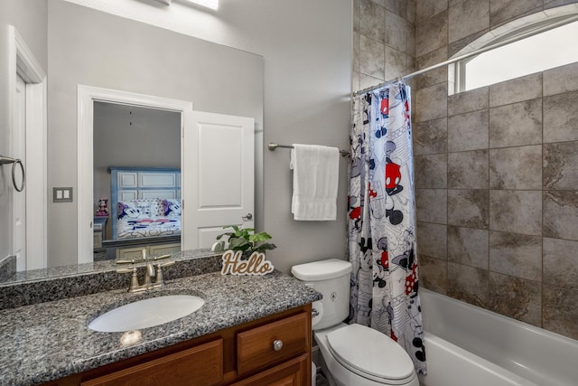 full bathroom featuring vanity, toilet, and shower / bath combo with shower curtain