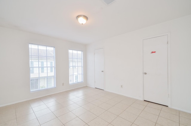 view of tiled empty room