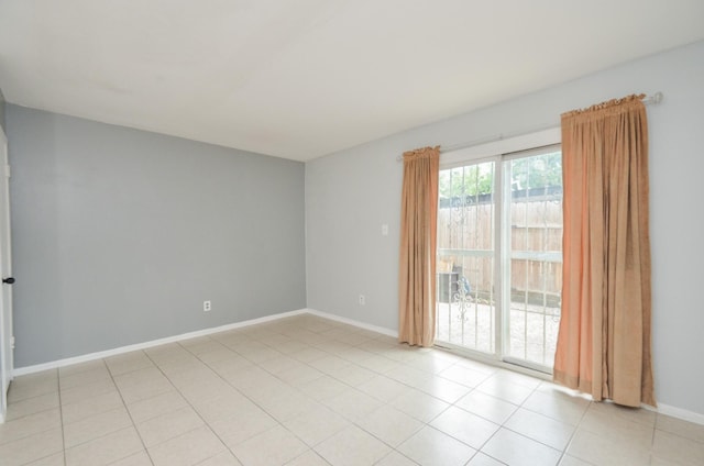 empty room with light tile patterned flooring