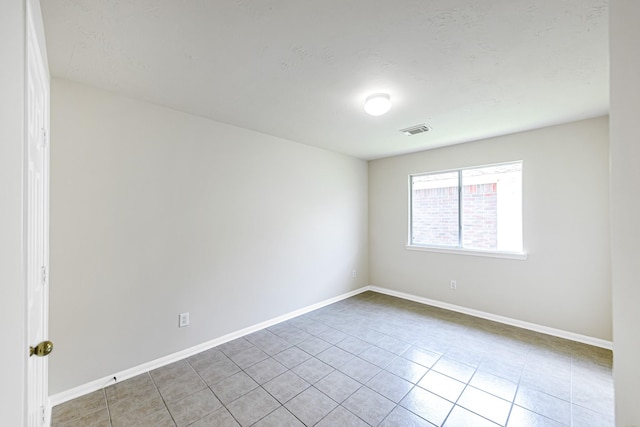 view of tiled empty room