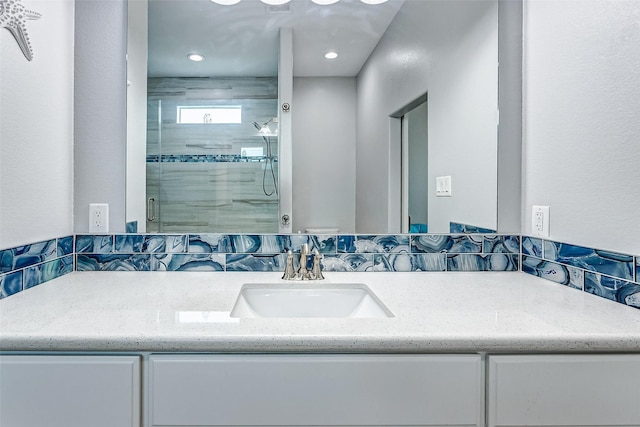 bathroom featuring vanity and walk in shower