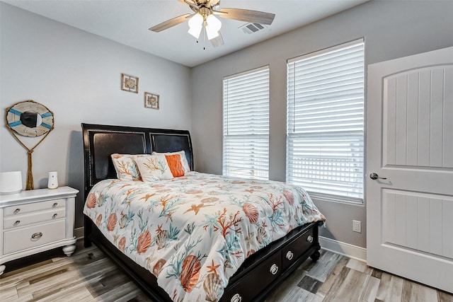 bedroom featuring ceiling fan and light wood-type flooring