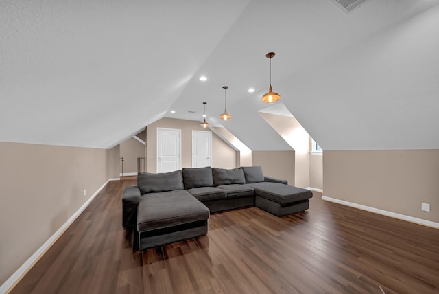 living room with lofted ceiling and dark wood-type flooring