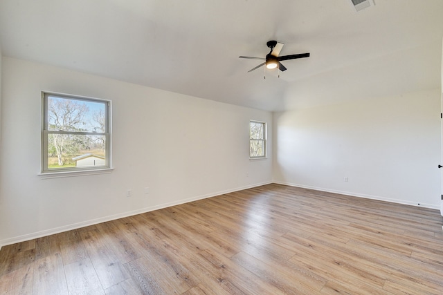 empty room featuring light hardwood / wood-style flooring and ceiling fan