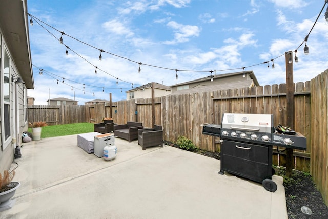 view of patio / terrace featuring a grill and an outdoor hangout area