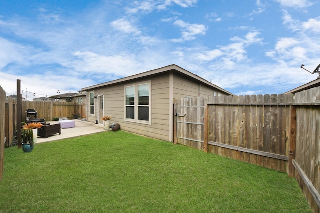 back of property featuring an outdoor living space, a patio, and a lawn