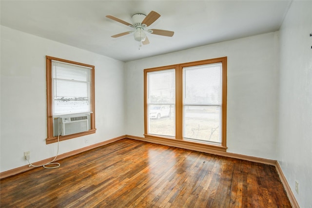 unfurnished room featuring cooling unit, dark wood-type flooring, and ceiling fan