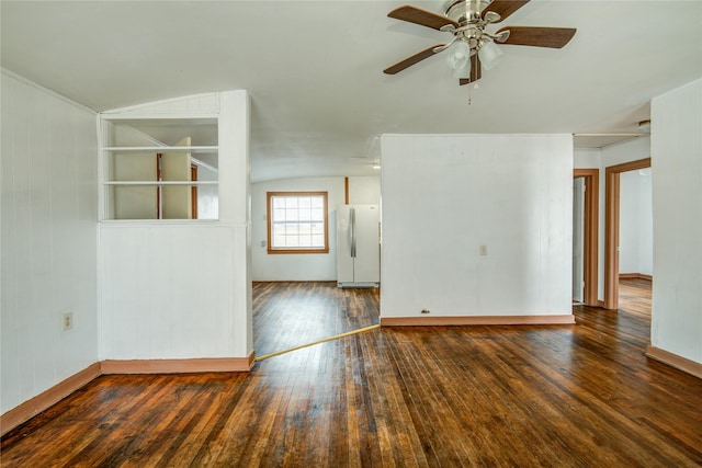 unfurnished room featuring dark wood-type flooring and ceiling fan