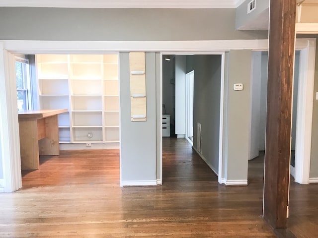 1632 W Alabama St, Houston, TX 77006 - interior space with wood finished floors, crown molding, visible vents, and baseboards