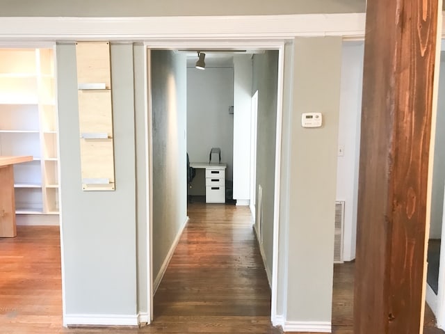 1632 W Alabama St, Houston, TX 77006 - hallway featuring wood finished floors and baseboards